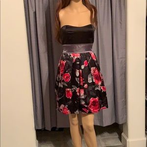 Black and floral strapless dress